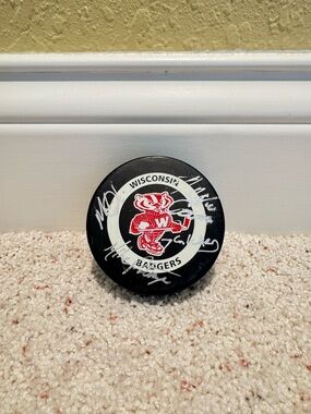 Wisconsin Badgers Autographed Hockey Puck - Black/Red/White